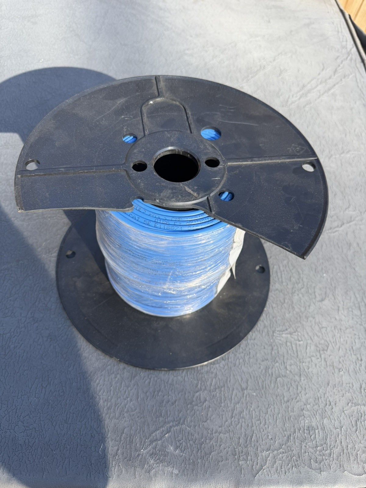 Southwire 300 ft. Blue 24/4 Solid CU CAT5e CMP (Plenum) Data Cable Roll Broken