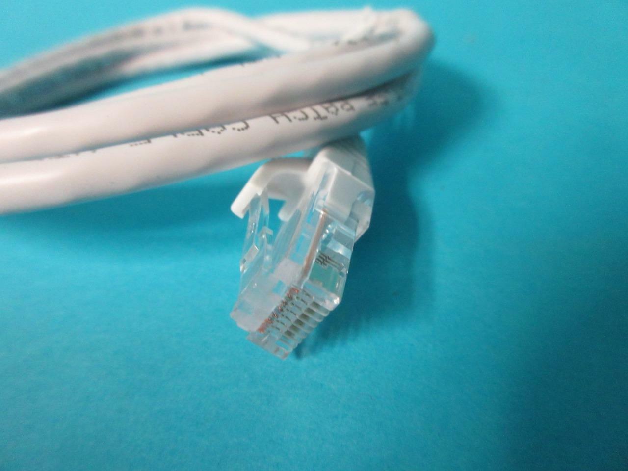 LOT OF 9 NEW QUICKTRON #77864 5 FT WHITE BOOTED CAT5E 350MHZ ROHS 570-125-005
