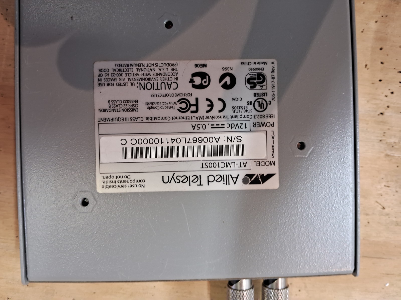 Allied Telesyn AT-LMC100ST, which is an IEEE 802.3 Compliant Transceiver.
